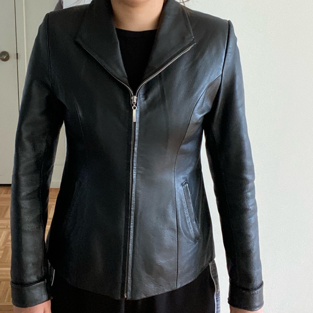 Faux leather jacket. Good quality, wind resistant